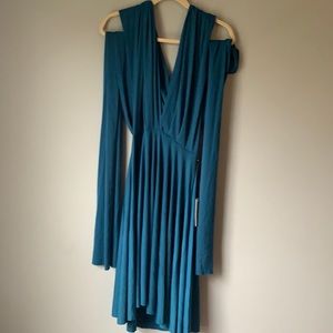 Transforming teal dress